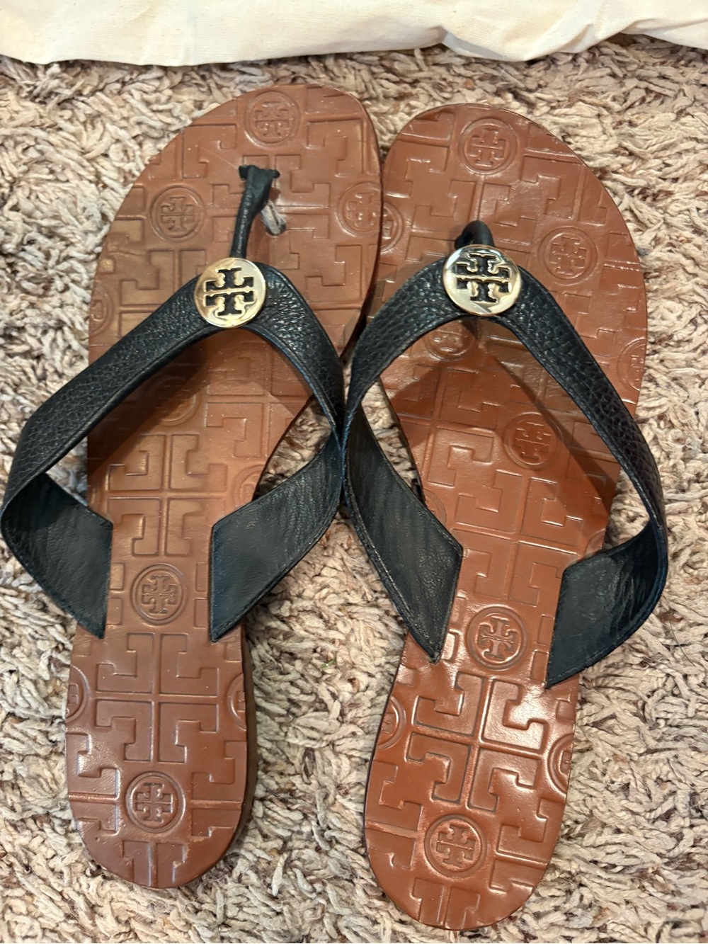 Tory Burch Black Leather Flip Flop Sandals with Gold Logo Medallions